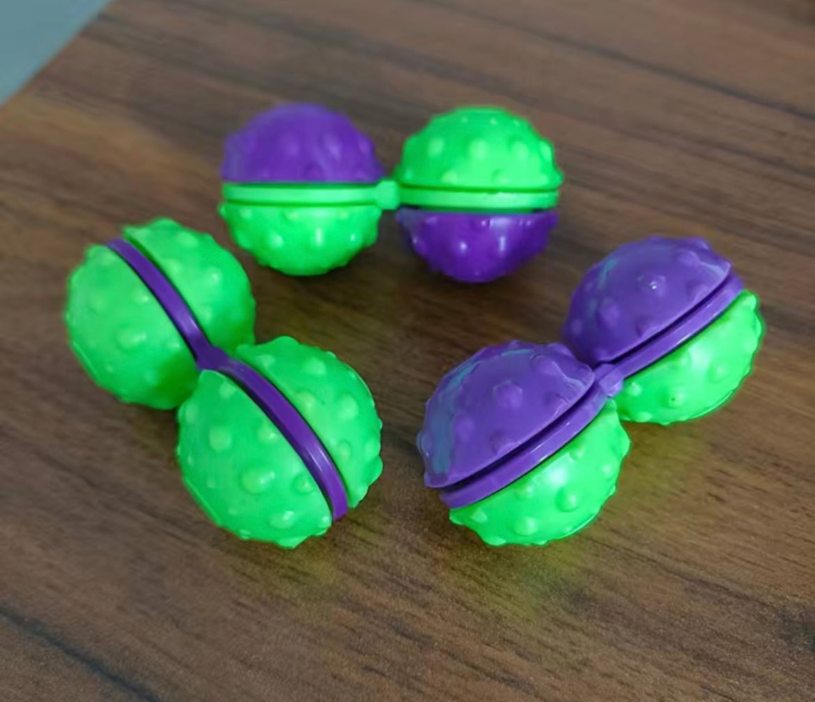 Rotating fidget balls